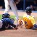 Chelsea catcher senior Tanner Strakey is too late as he reaches out to tag St. Joseph senior Nicholas Lawrence at home plate during their quarter final match up at Ray Fisher Stadium on Tuesday. Melanie Maxwell I AnnArbor.com